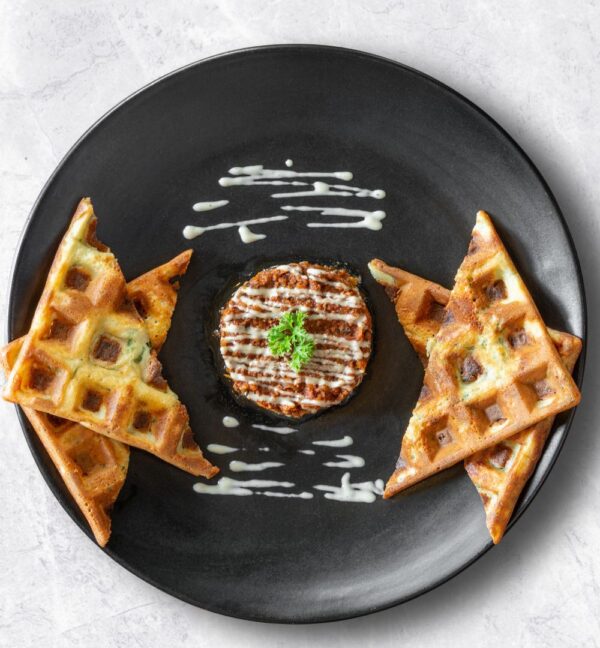 Spinach Waffles with Beef Ragu and Creamy Cashew Cheese topping